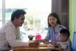 © SVRSLYIMAGES - family enjoying the day at cafe in the morning
