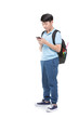 © sirikorn - Student boy with backpack and stationery holding cell phone .