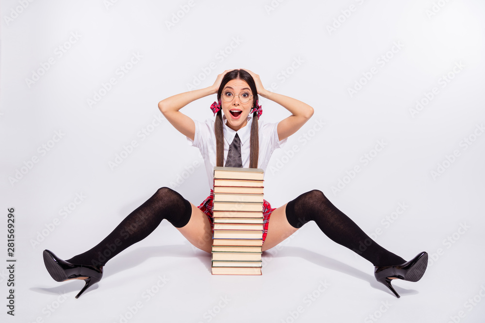 Full length body size photo beautiful she her teacher sit floor book pile between open legs hips tails excited wear specs short red checkered costume pantyhose tights isolated white background - obrazy, fototapety, plakaty 