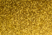 Holiday Golden Bokeh Background With Rings Of Sparkles Light