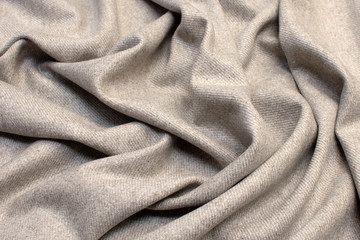 Wall Mural - The texture of cashmere fabric beige. Background, pattern.