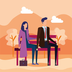 Wall Mural - elegant business couple seated in the park chair