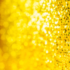 Wall Mural - shining in the sun golden sequins texture festive background