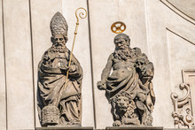 Decorative Facade Statues Of Priests And Bishops At Saint Salvator Church Near Charles Bridge In Prague, Czech Republic, Summer Time, Details