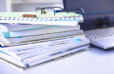 Group of multicolored office folders and glasses