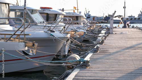 Fotomural View on the swing moorings and pile moorings of the boats in the port