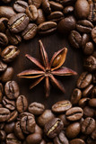 Fototapeta Boho - Close-up coffee beans on a dark wood background in circle shape with anise star in it