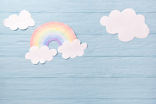 Children Or Baby Background, White Clouds With Rainbow On The Blue Wooden Background