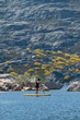 © homydesign - Stand up paddle on a lake