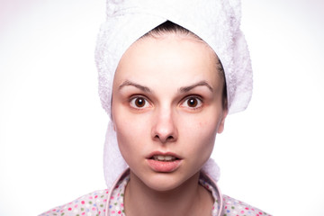 beautiful girl in pajamas and a towel on her head