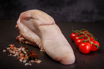 closeup cow tongue served with spices and tomatoes cherry