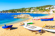 Fishing boats on picturesque beach in Calella de Palafrugell village, Costa Brava, Catalonia, Spain