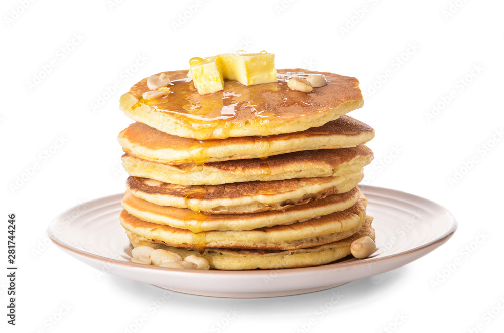 Tasty pancakes with butter on white background