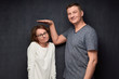 © Andrei Korzhyts - Shot of funny tall man and short woman