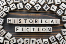 Historical Fiction - Word From Wooden Blocks With Letters, Literary Genres Concept, Random Letters Around, Top View On Wooden Background