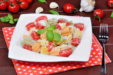 Poster - Pasta with parmesan cheese, cherry tomatoes and basil on table