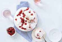 Pavlova Meringue Cake With Whipped Cream And Fresh Raspberries. Seasonal Summer Dessert