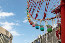 Colourful Ferris Wheel Against Blue Skies II