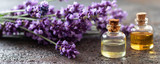 Panoramic header of essential oil bottles and lavender