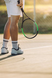 Fototapeta Sport - Tennis player a on hard court