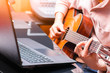 © princeoflove - man enjoy learning online guitar lesson from internet