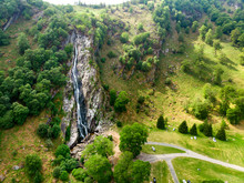 Majestic Water Cascade Of Powerscourt Waterfall, The Highest Waterfall In Ireland. Tourist Atractions In Co. Wicklow, Ireland.