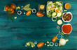 © Виктория Саврей - VEGETABLES ON BACKGROUND. FRESH VEGETABLES AND SPICES ON A WOODEN SURFACE. COPY SPACE