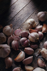 Wall Mural - Garlic bulb and clove on rustic wooden