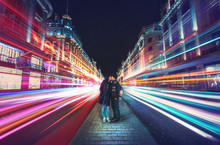 Kissing Couple In The Center Of Regent Street, London At Night