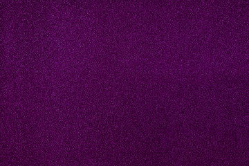 Wall Mural - purple sparkling background from small sequins, closeup. Brilliant shiny backdrop from textile.