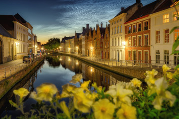 Wall Mural - Noctilucent clouds (night shining clouds) at city Bruges (Brugge) old town in Belgium in the dusk, Europe