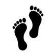 © Petar - Human feet black silhouette on white background. Footprint with toes symbol icon.