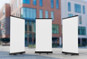 Wall Mural - 3D rendering of blank vertical rollup (empty billboard advertisement) with city background. Empty mockup template