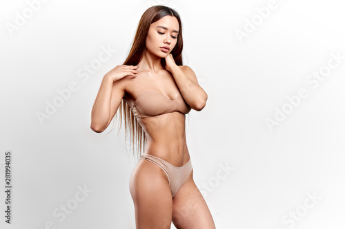 sexy passionate girl with closed eyes touching her neck Fototapet