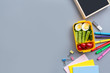 © Алина Бузунова - School supplies and lunch box with sandwich and vegetables. Back to school. Healthy eating habits concept - background layout with free text space. Flat lay composition, mockup, top view
