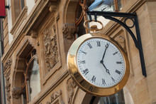Closeup Of Vintage Clock In The Street