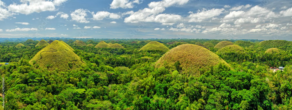 The Chocolate Hills  -  geological formation in the Bohol province of the Philippines. - obrazy, fototapety, plakaty 