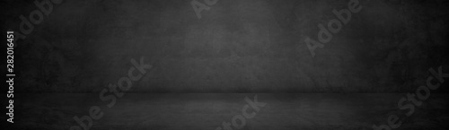 Fotomural black cement studio and dark showroom background for present products