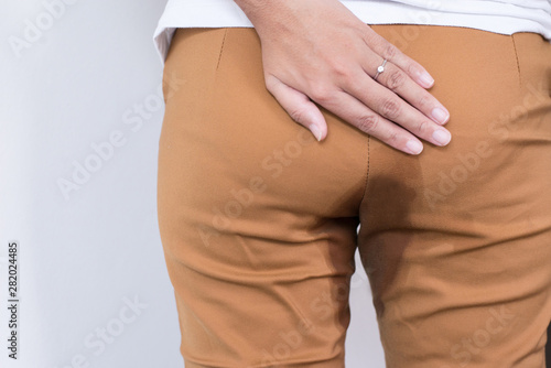 Fotomural Hands woman holding her bottoms,Female need to pee,Urinary stain incontinence,Co