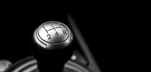 Close Up View Of A Manual Gear Lever Shift Isolated On Black Background. Manual Gearbox. Car Interior Details. Car Transmission. Soft Lighting. Abstract View. Car Detailing