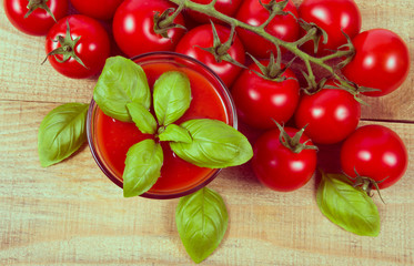 Wall Mural - Fresh tomato juice as a source of vitamins. Wooden background.