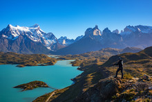 Hiker At Mirador Condor Enjoying Amazing View Of Los Cuernos Rocks And Lake Pehoe In Torres Del Paine National Park, Patagonia, Chile