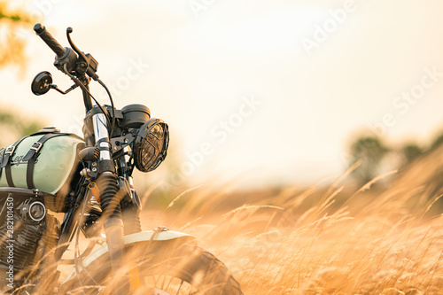 Fotografía Vintage motorcycle in the sunset
