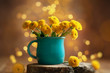 © Svetlana Kolpakova - Beautiful yellow flower in blue cup on wooden table at bokeh  background, front view. Autumn still life with chrysanthemum flower.