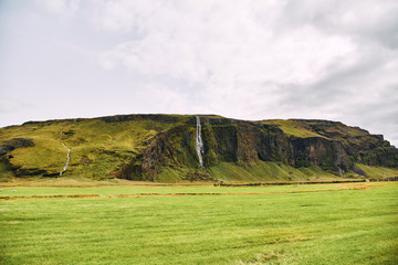 Wall Mural - Small waterfalls in iceland. Summer