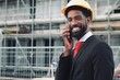 © Djomas - Construction worker and architect outside