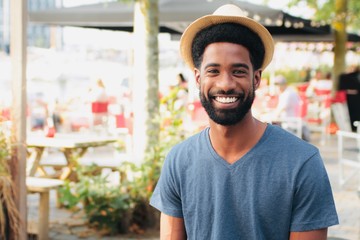 Canvas Print - Beautiful happy man outside in the park