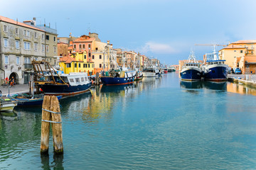 Wall Mural - Sottomarina, Italy - July, 07, 2019: cityscape with the image of channel in Sottomarina, Italy, the small town near Venice