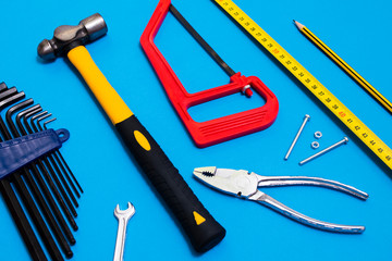 tool kit on blue background. chopped flat