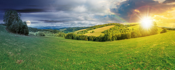 panoramic mountain landscape day and night time change concept. grassy meadow on the hillside. trees